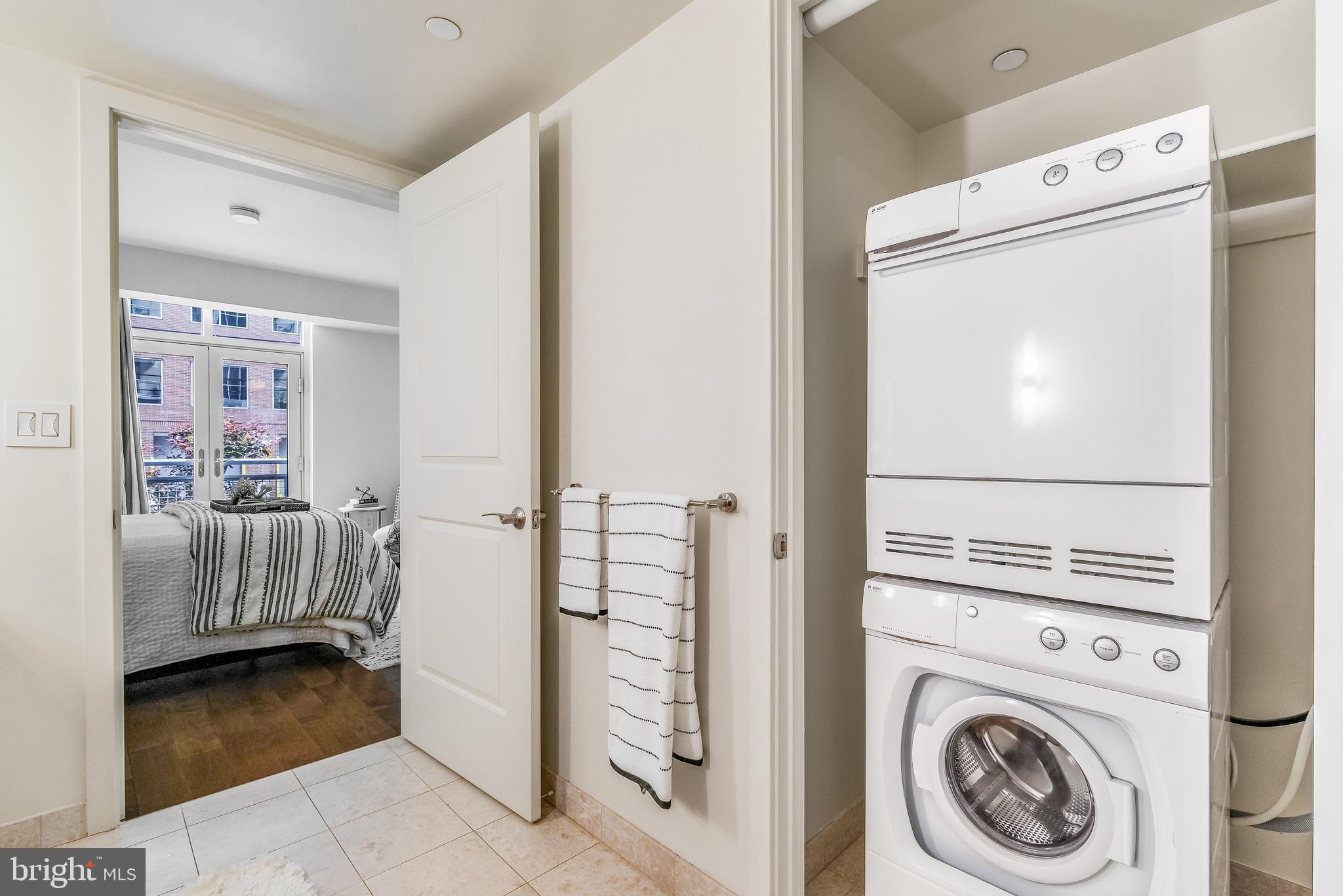 1025 First Street Southeast, Unit 201 Washington, DC 20003 - Photo 19 of 31 a view of living room washer and dryer