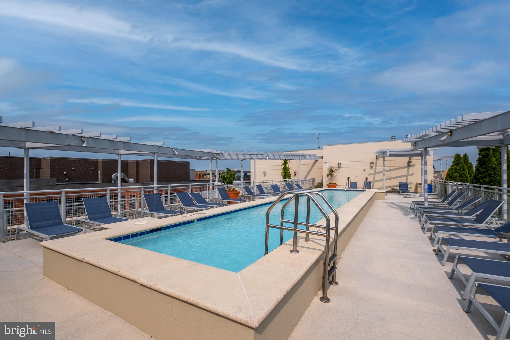 1025 First Street Southeast, Unit 201 Washington, DC 20003 - Photo 30 of 31 swimming pool view with a seating space