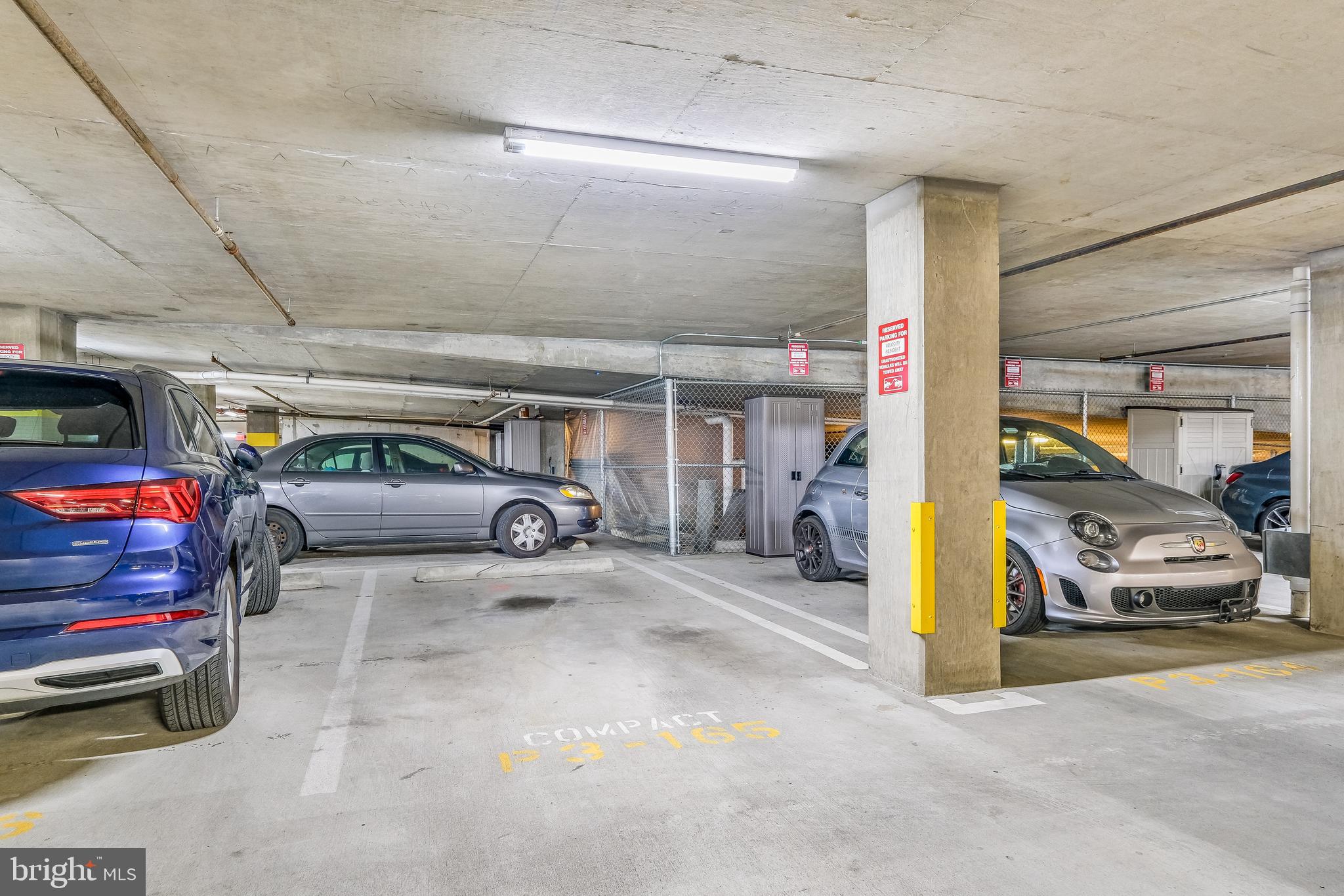 1025 First Street Southeast, Unit 201 Washington, DC 20003 - Photo 31 of 31 a view of parking garage with cars parked