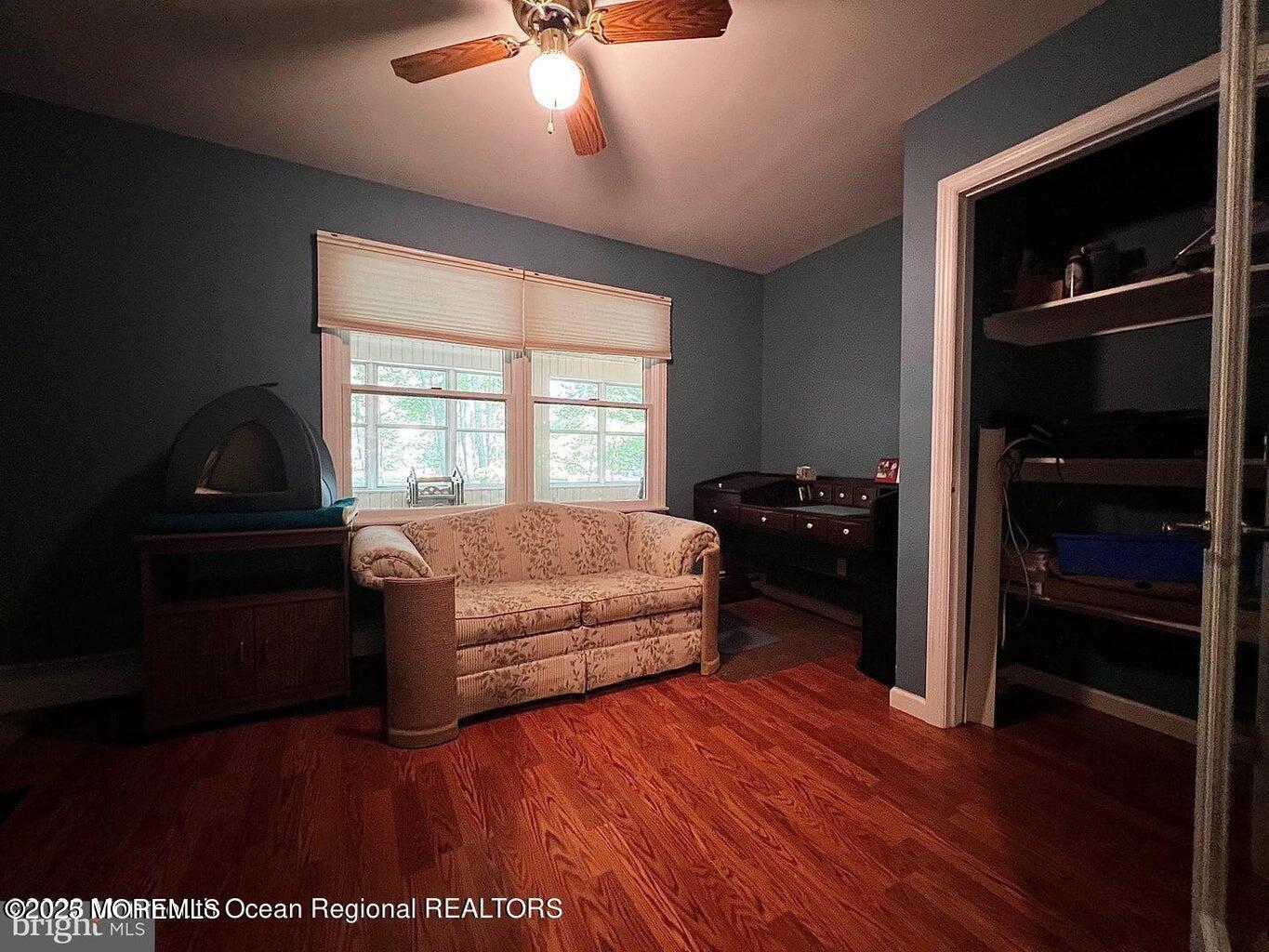 791 Harmony Road Jackson, NJ 08527 - Photo 12 of 16 a living room with furniture and a flat screen tv