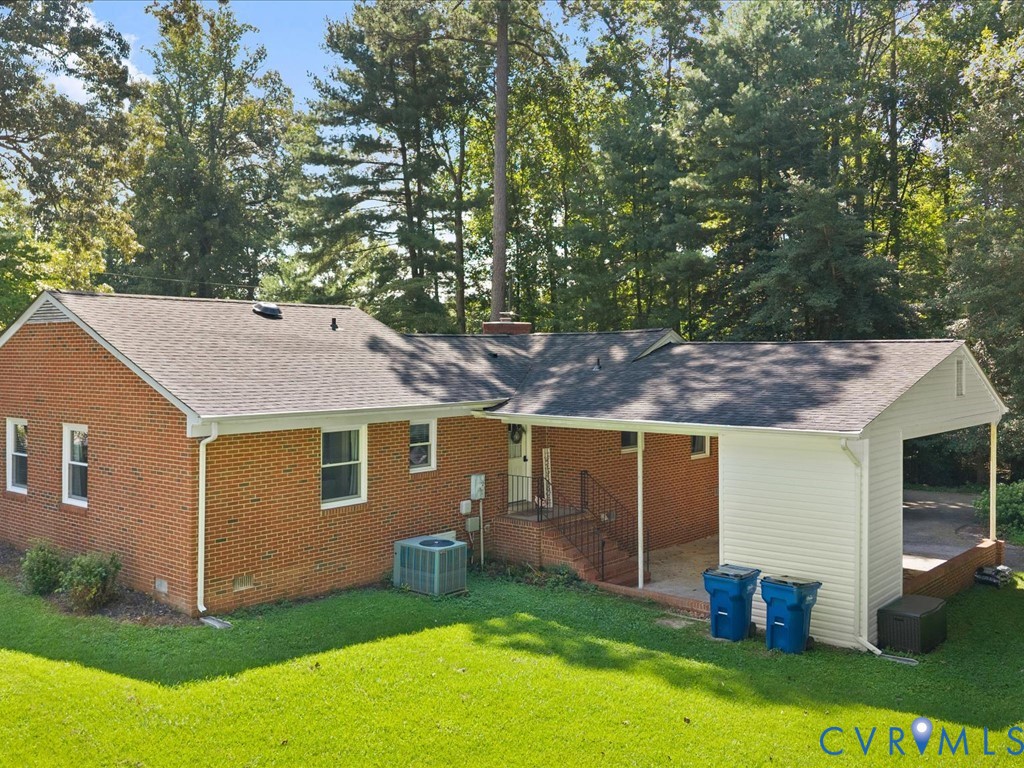 12724 South Chester Road Chester, VA 23831 - Photo 30 of 37 Brick exterior with a covered carport, covered pat