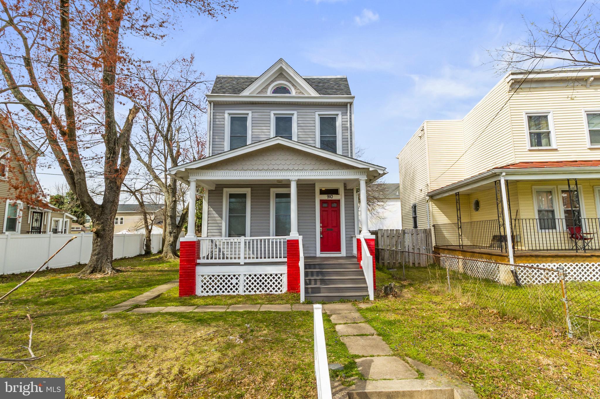 910 Savannah Street Southeast Washington, DC 20032 - Photo 1 of 26 a front view of a house with a yard