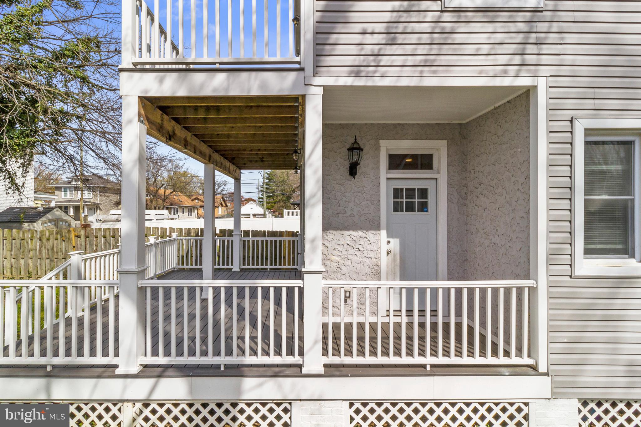 910 Savannah Street Southeast Washington, DC 20032 - Photo 12 of 26 a porch with a yard