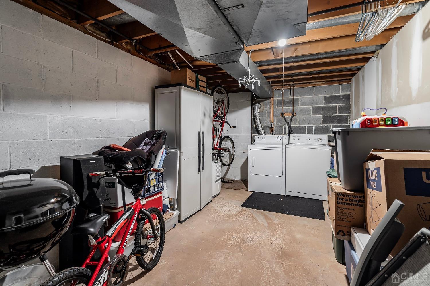 606 Robin Road Hillsborough, NJ 08844 - Photo 20 of 20 a view of a storage room with a lot of stuff