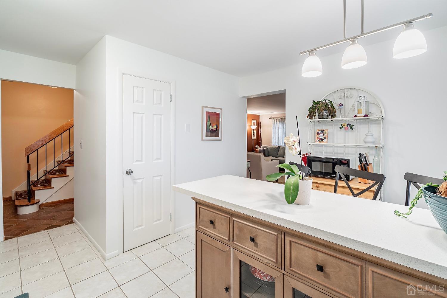 606 Robin Road Hillsborough, NJ 08844 - Photo 3 of 20 a kitchen with a sink and cabinets