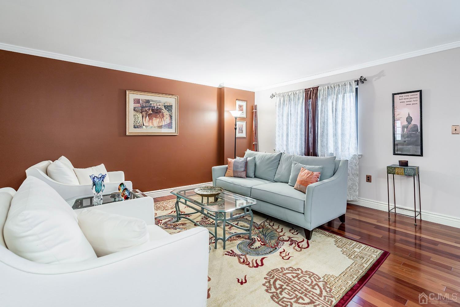 606 Robin Road Hillsborough, NJ 08844 - Photo 7 of 20 a living room with furniture and wooden floor