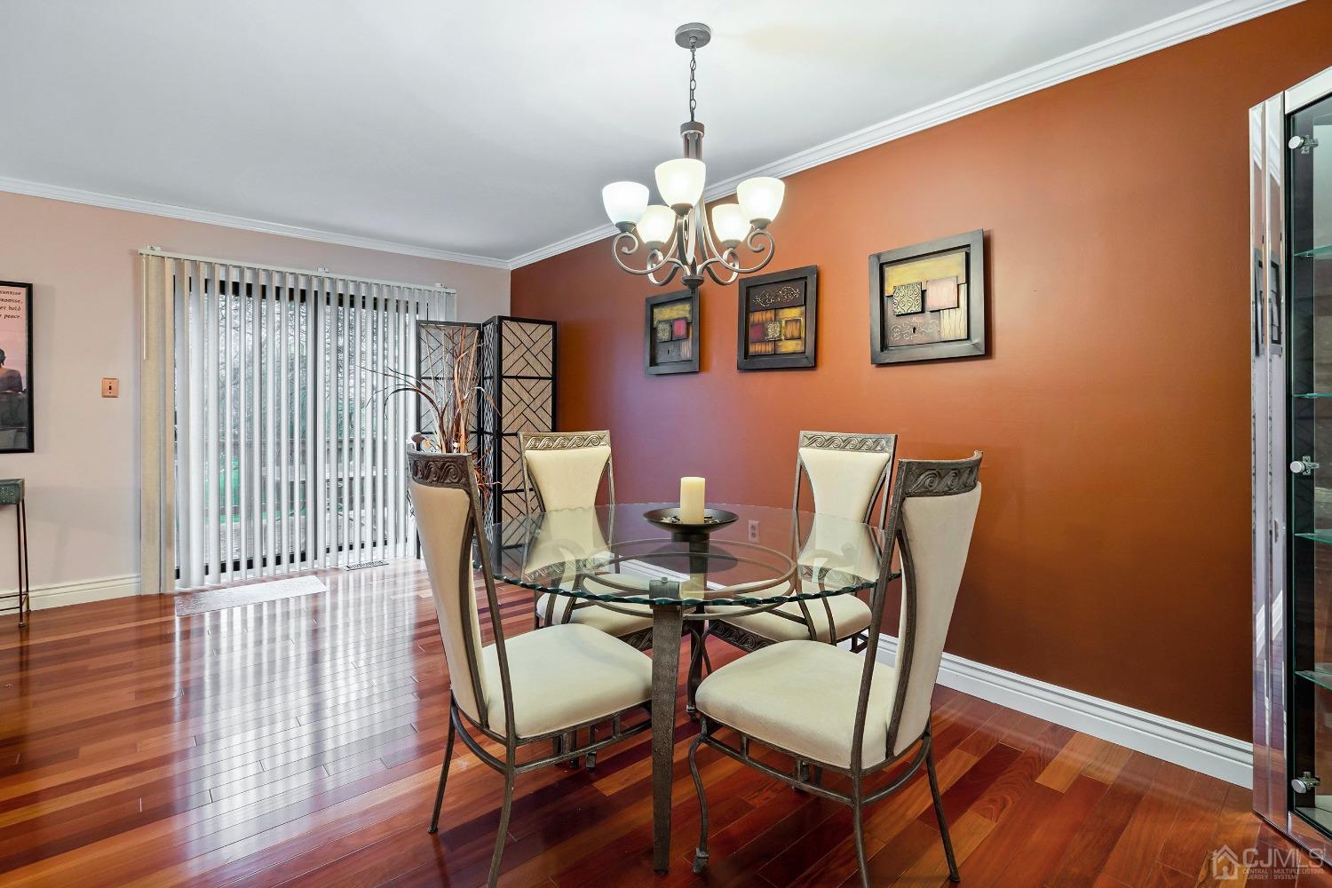 606 Robin Road Hillsborough, NJ 08844 - Photo 10 of 20 a view of a dining room with furniture and wooden floor
