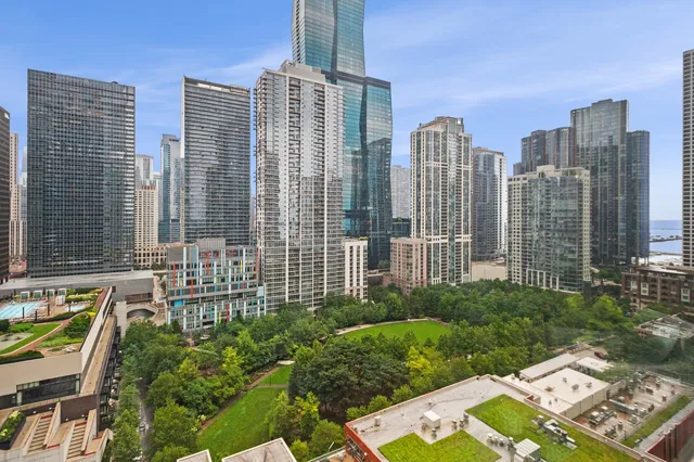 a view of a city with tall buildings