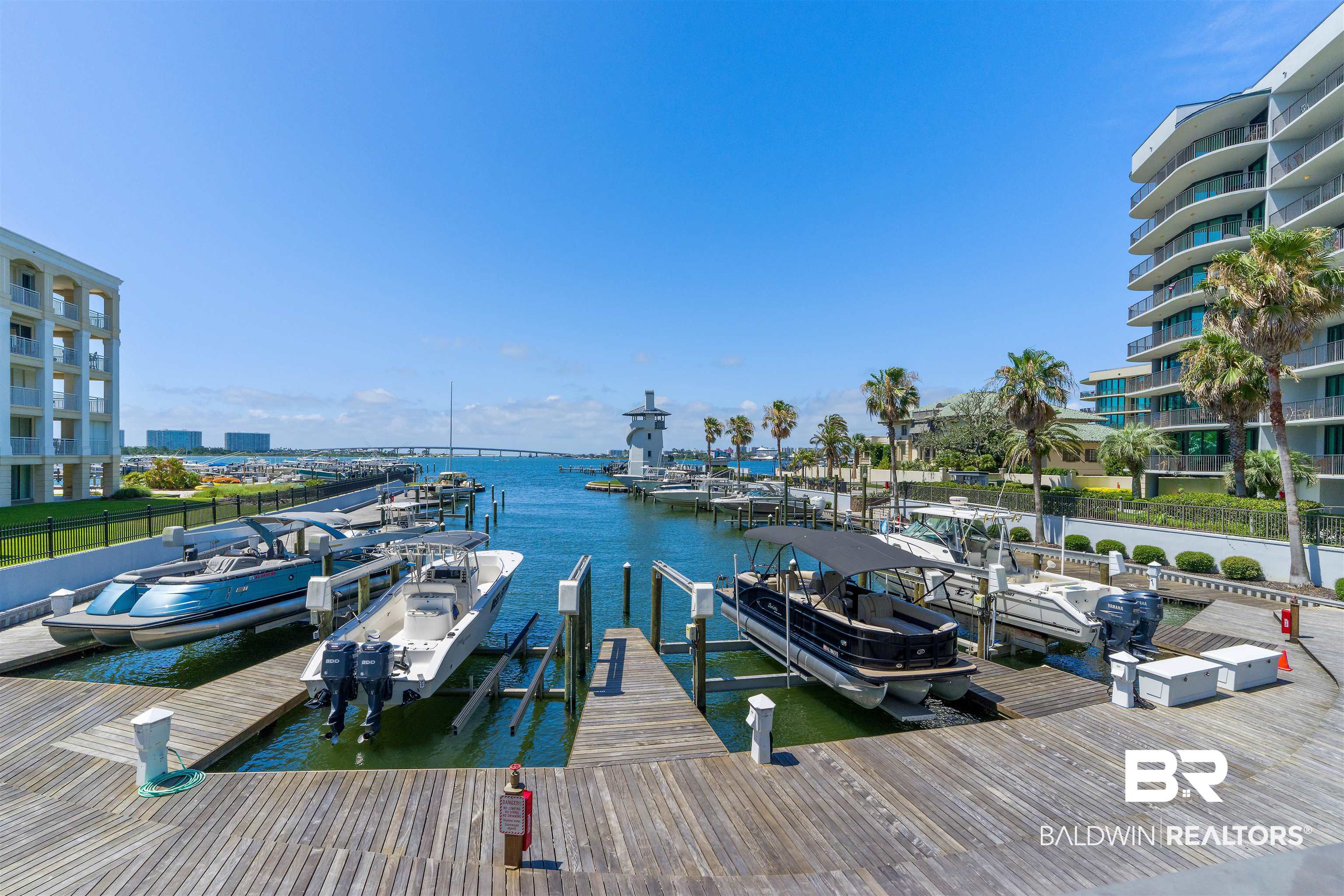 27582 Canal Road, Unit 2408 Orange Beach, AL 36561 - Photo 35 of 47 View of dock featuring a water view