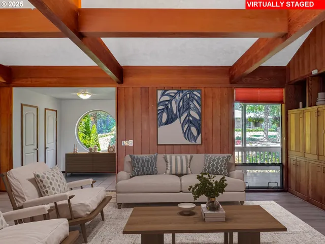 a view of a room with cabinet and wooden floor