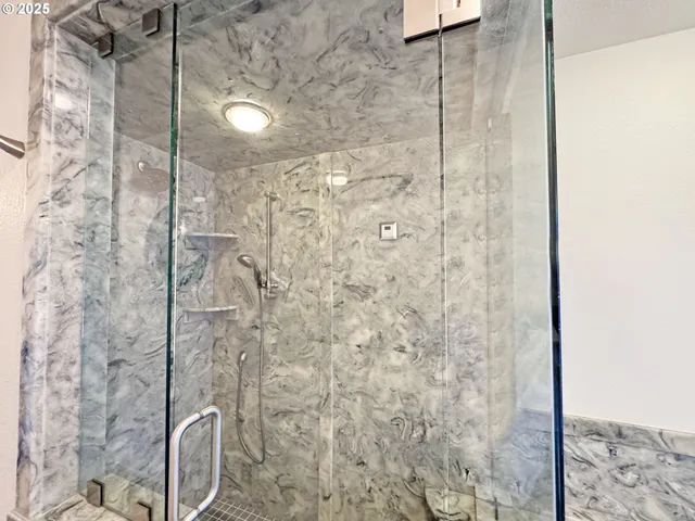 a view of a room with wooden floor and staircase