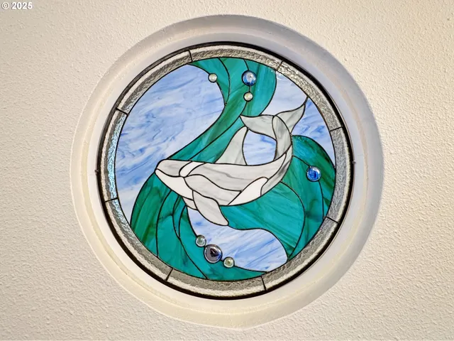 a view of a door and a window