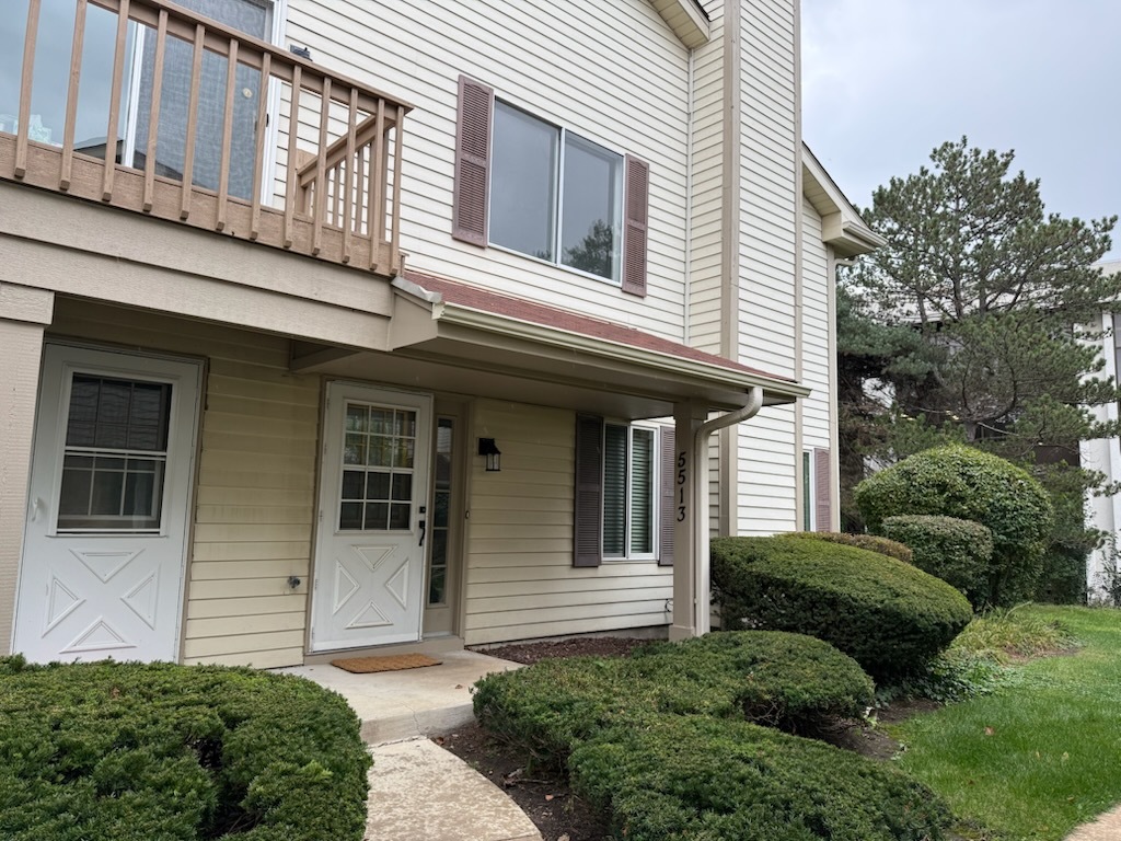 5513 Barclay Court Clarendon Hills, IL 60514 - Photo 2 of 20 a view of a house with a small yard and plants