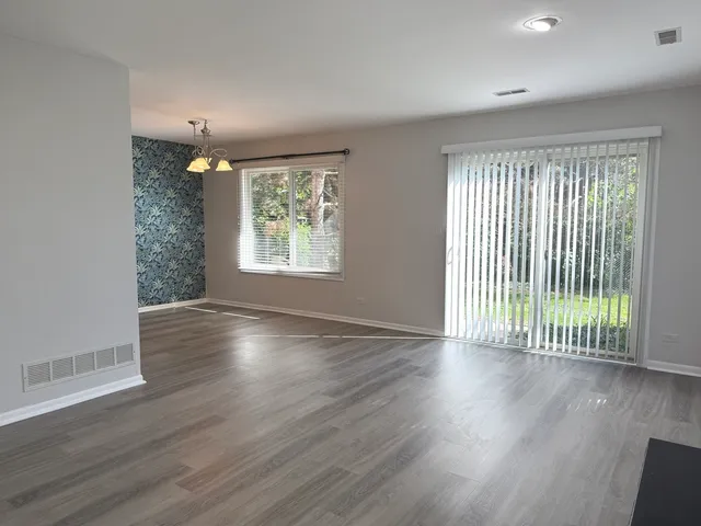 a bathroom with a sink toilet and mirror
