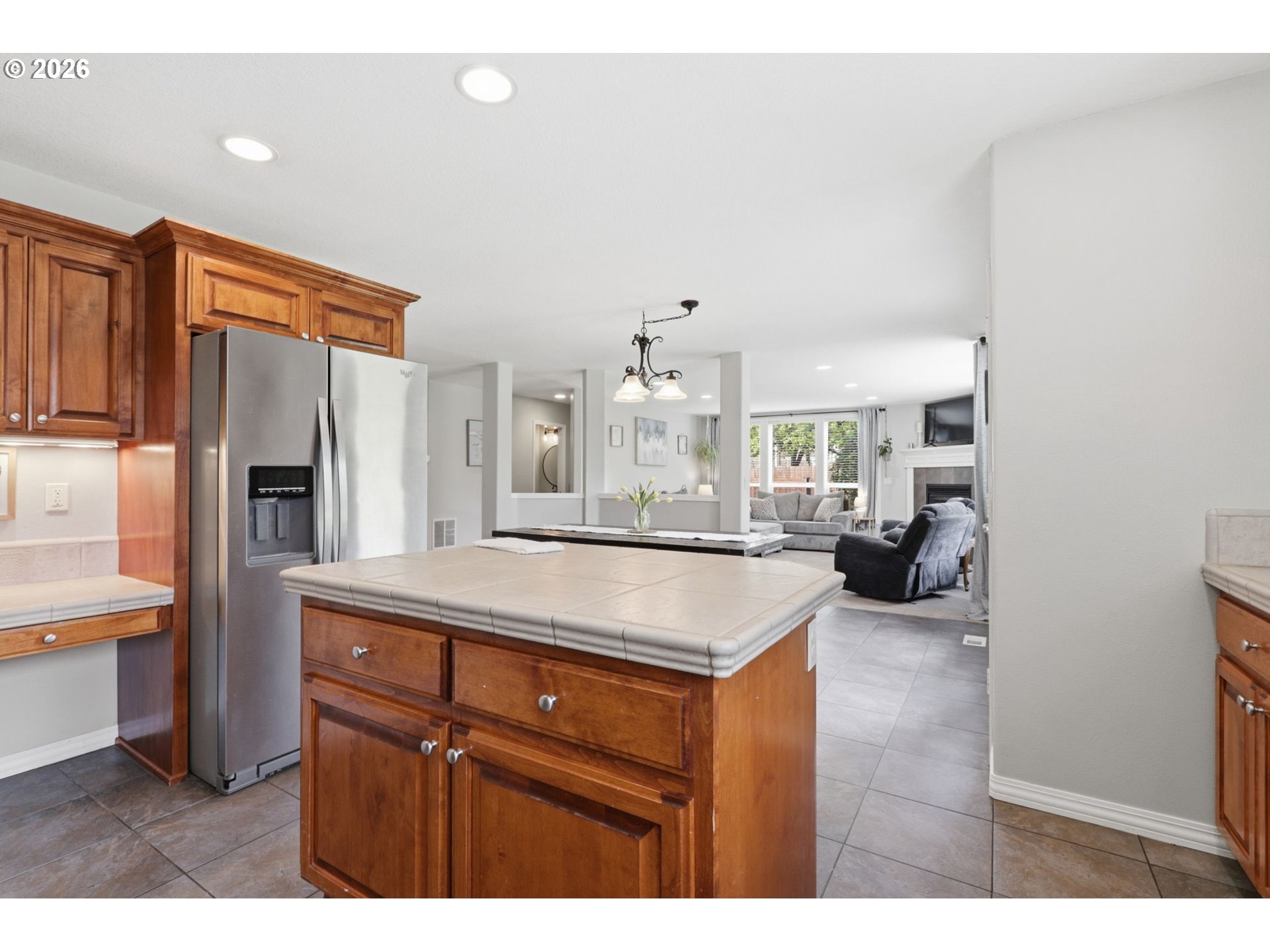 3306 Solstice Lane Newberg, OR 97132 - Photo 13 of 47 a kitchen with refrigerator and cabinets