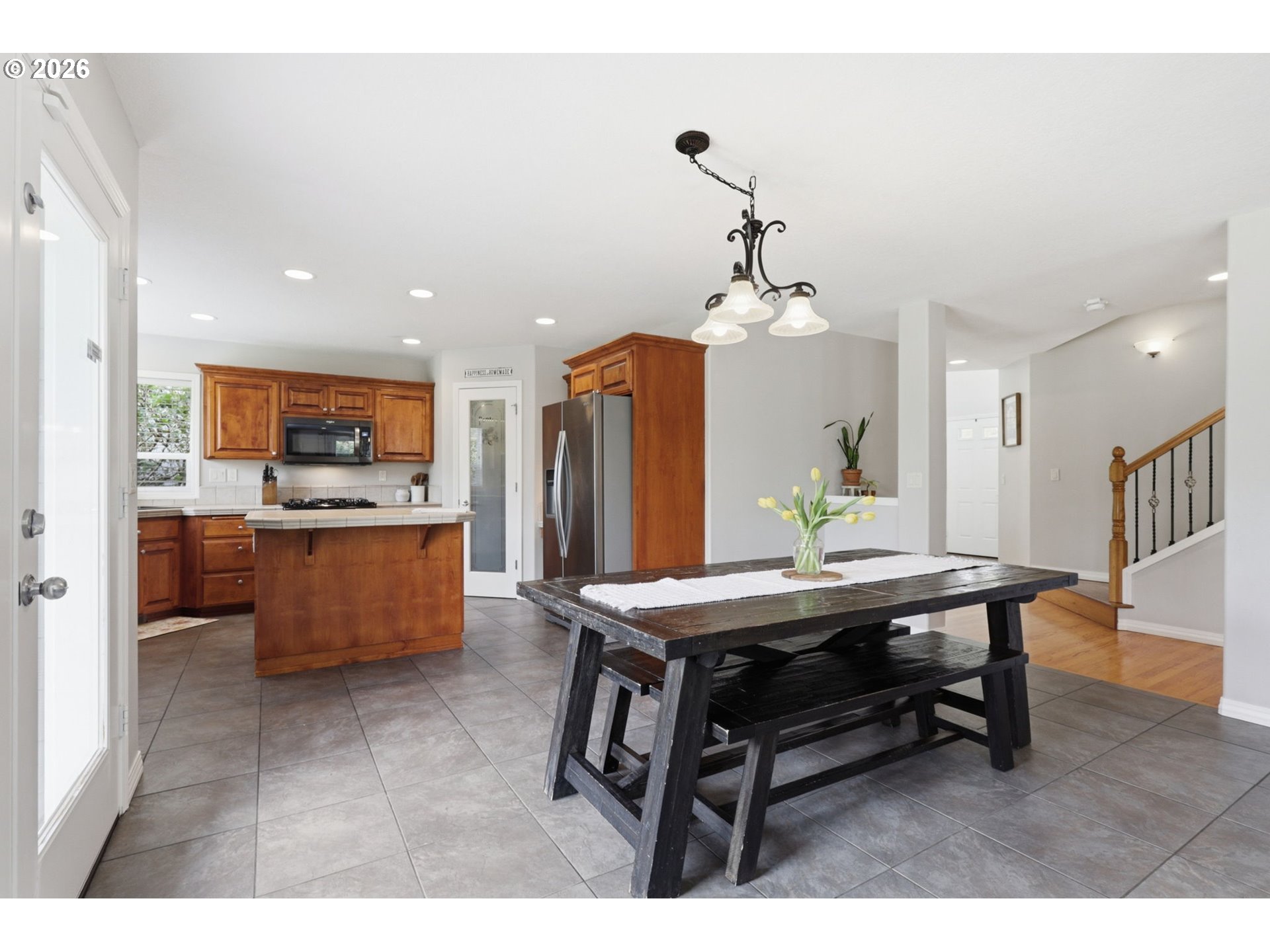 3306 Solstice Lane Newberg, OR 97132 - Photo 15 of 47 a kitchen with a table and chairs in it
