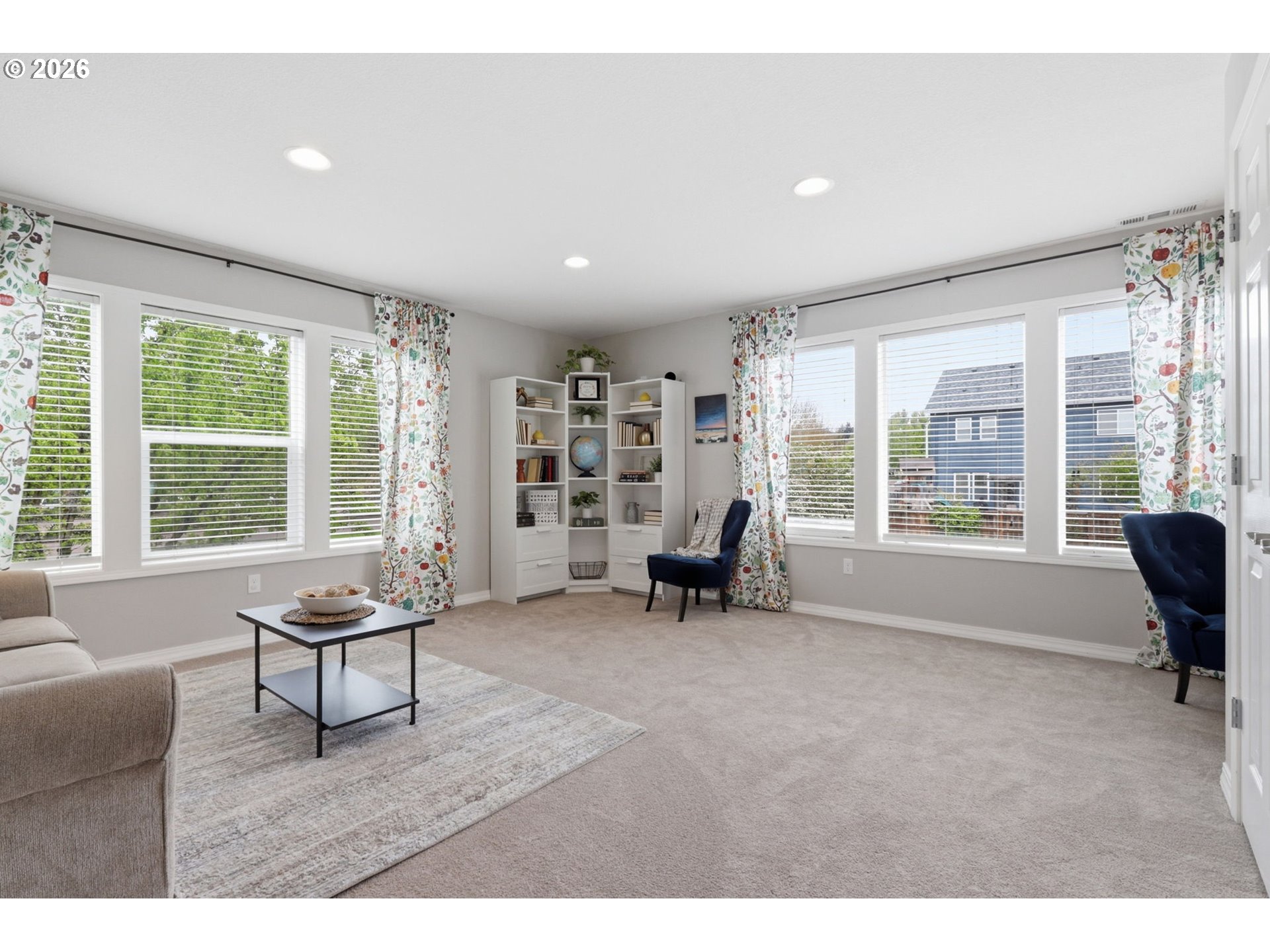 3306 Solstice Lane Newberg, OR 97132 - Photo 23 of 47 a living room with furniture and large windows