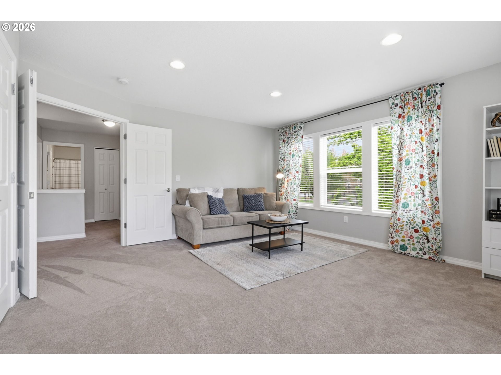 3306 Solstice Lane Newberg, OR 97132 - Photo 24 of 47 a living room with furniture and large windows