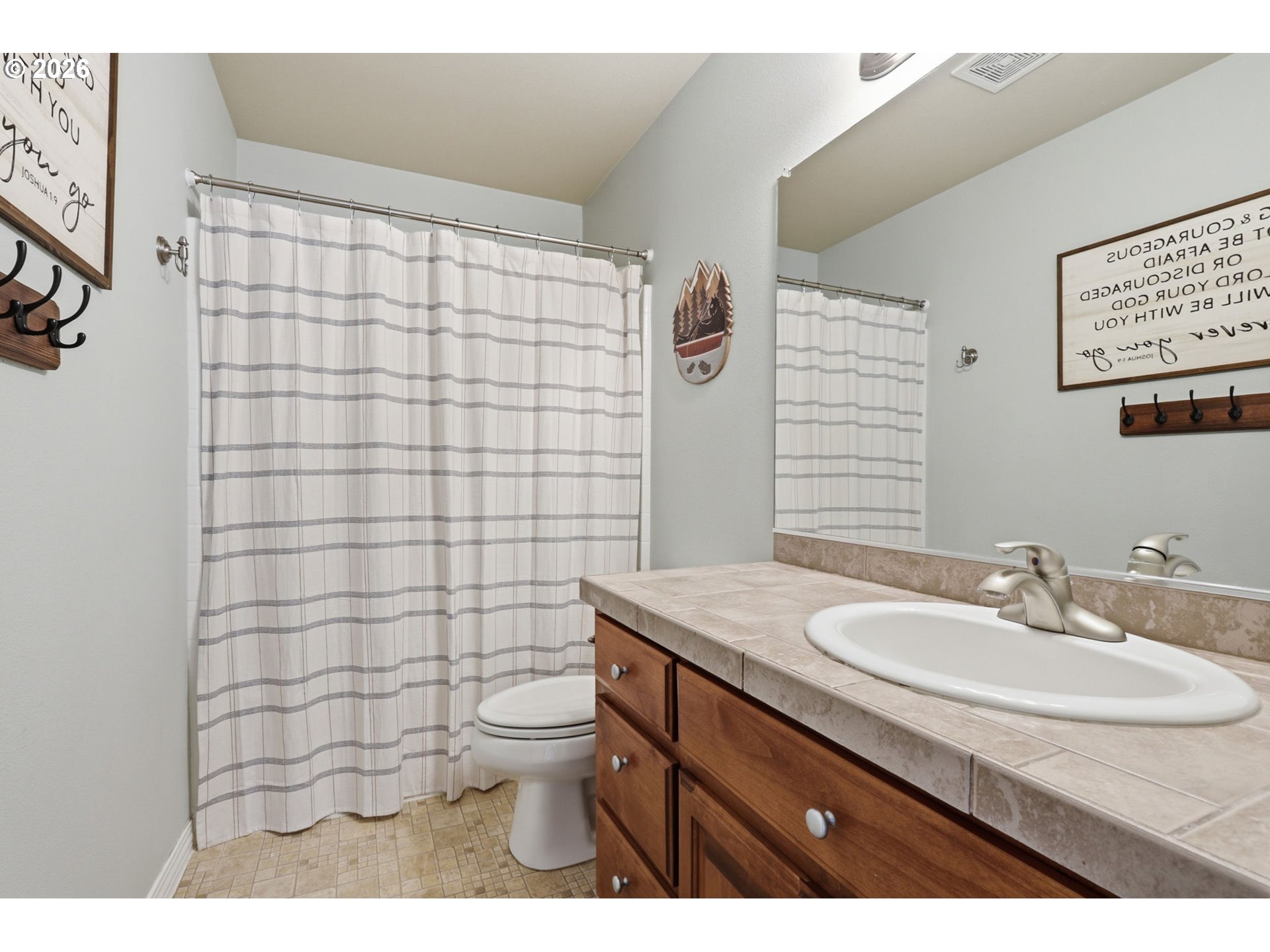 3306 Solstice Lane Newberg, OR 97132 - Photo 28 of 47 a bathroom with a sink toilet and shower