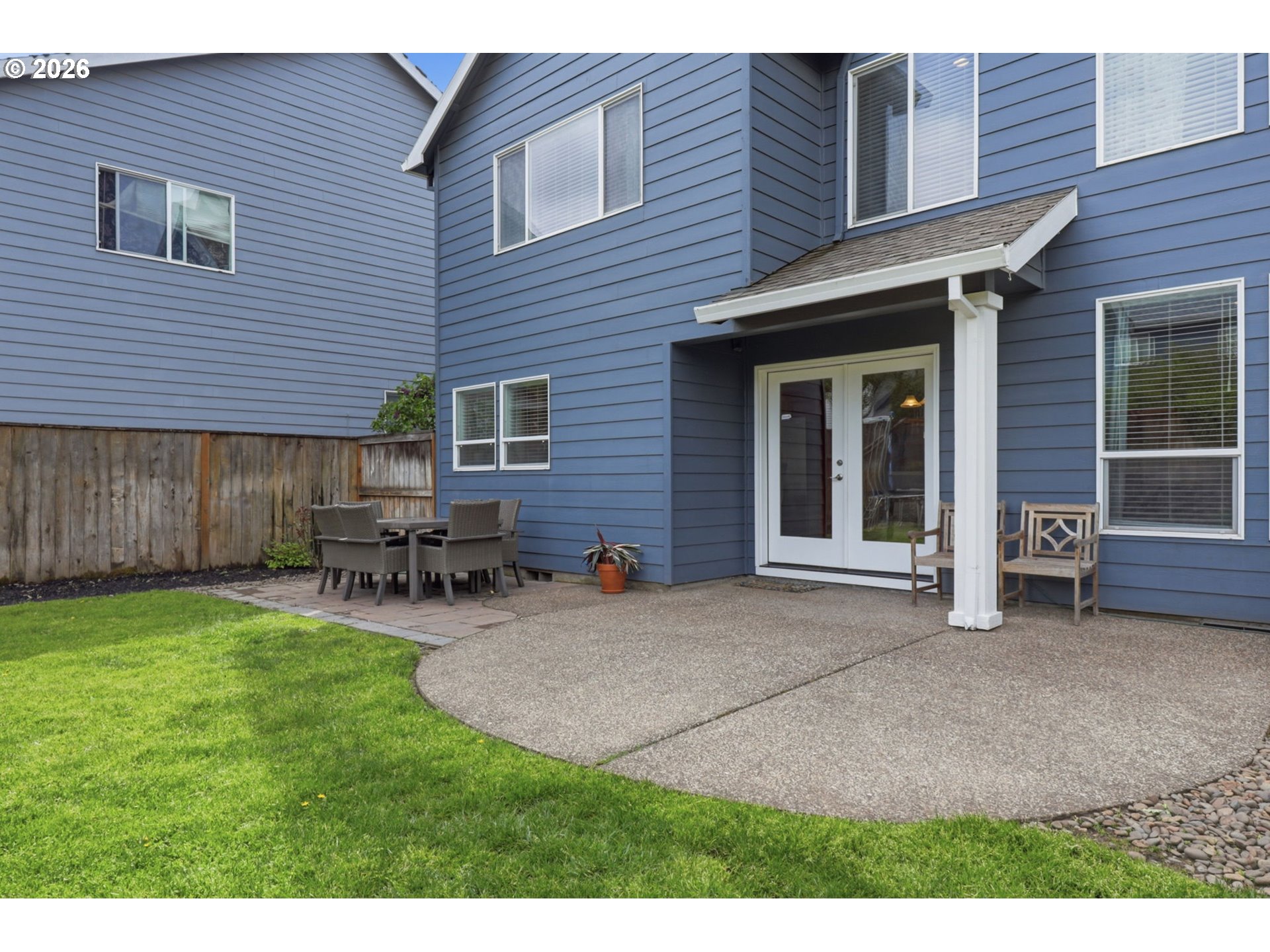 3306 Solstice Lane Newberg, OR 97132 - Photo 38 of 47 a view of a house with patio and a yard