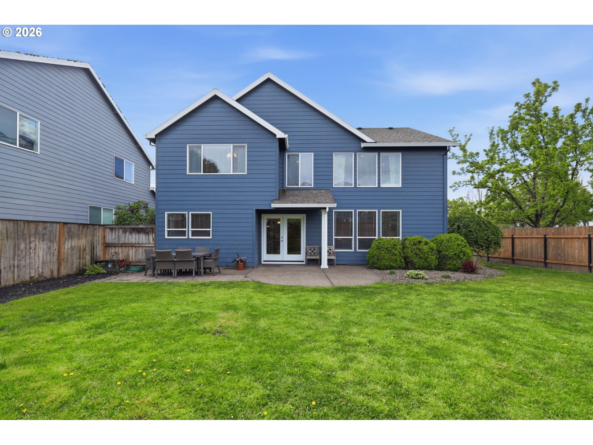 3306 Solstice Lane Newberg, OR 97132 - Photo 40 of 47 a front view of a house with a garden