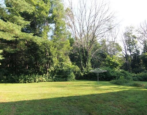 31 Dudley Road Billerica, MA 01821 - Photo 19 of 20 a view of a swimming pool with an outdoor space and seating area
