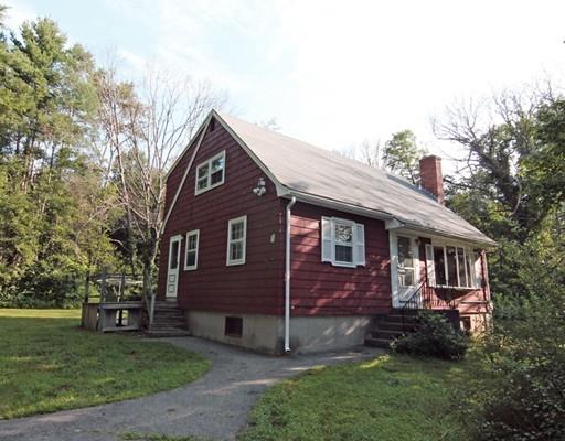 31 Dudley Road Billerica, MA 01821 - Photo 20 of 20 a front view of a house with a garden