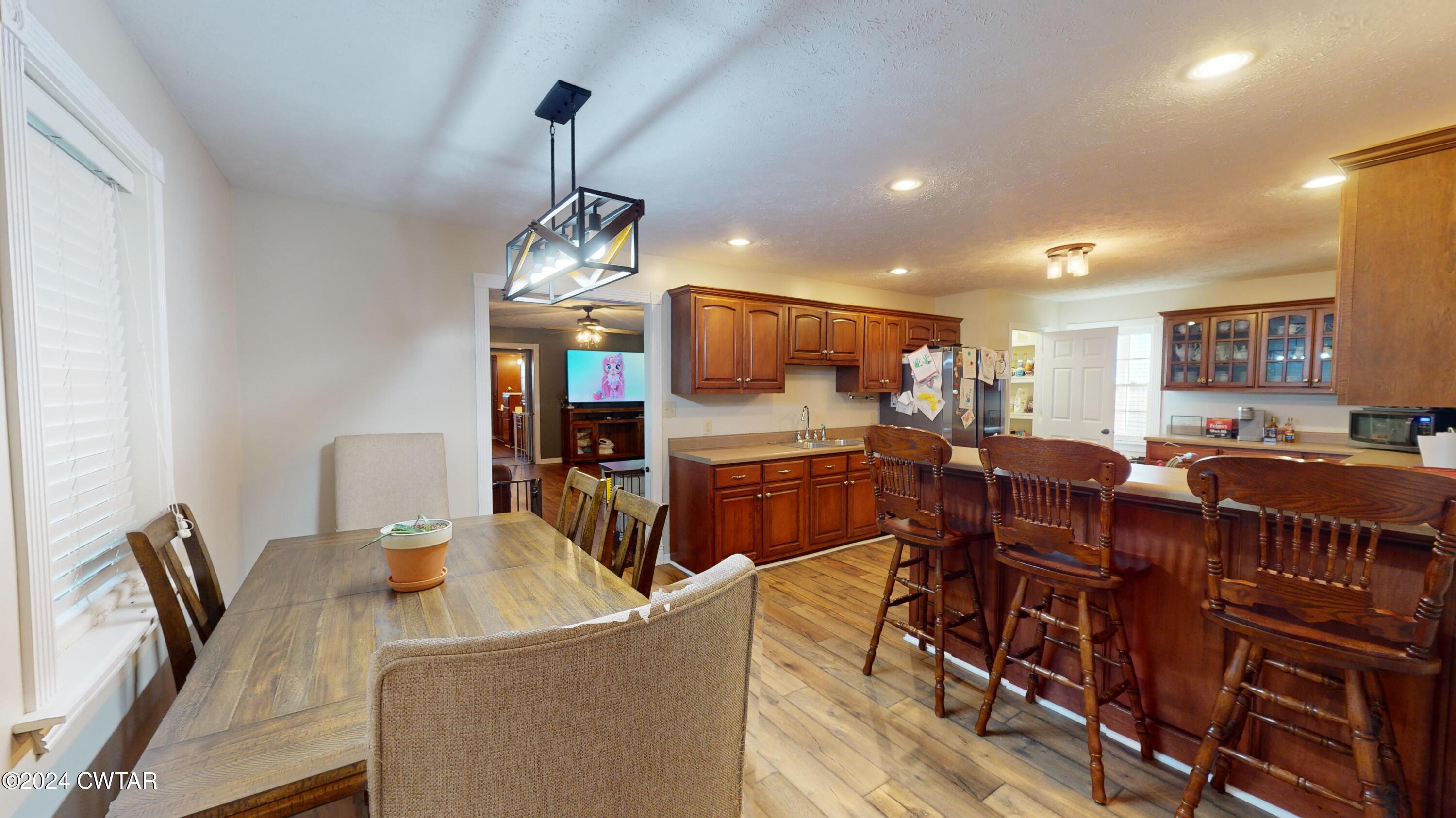 3999 Cloverdale Road Obion, TN 38240 - Photo 17 of 42 a view of a dining room with furniture