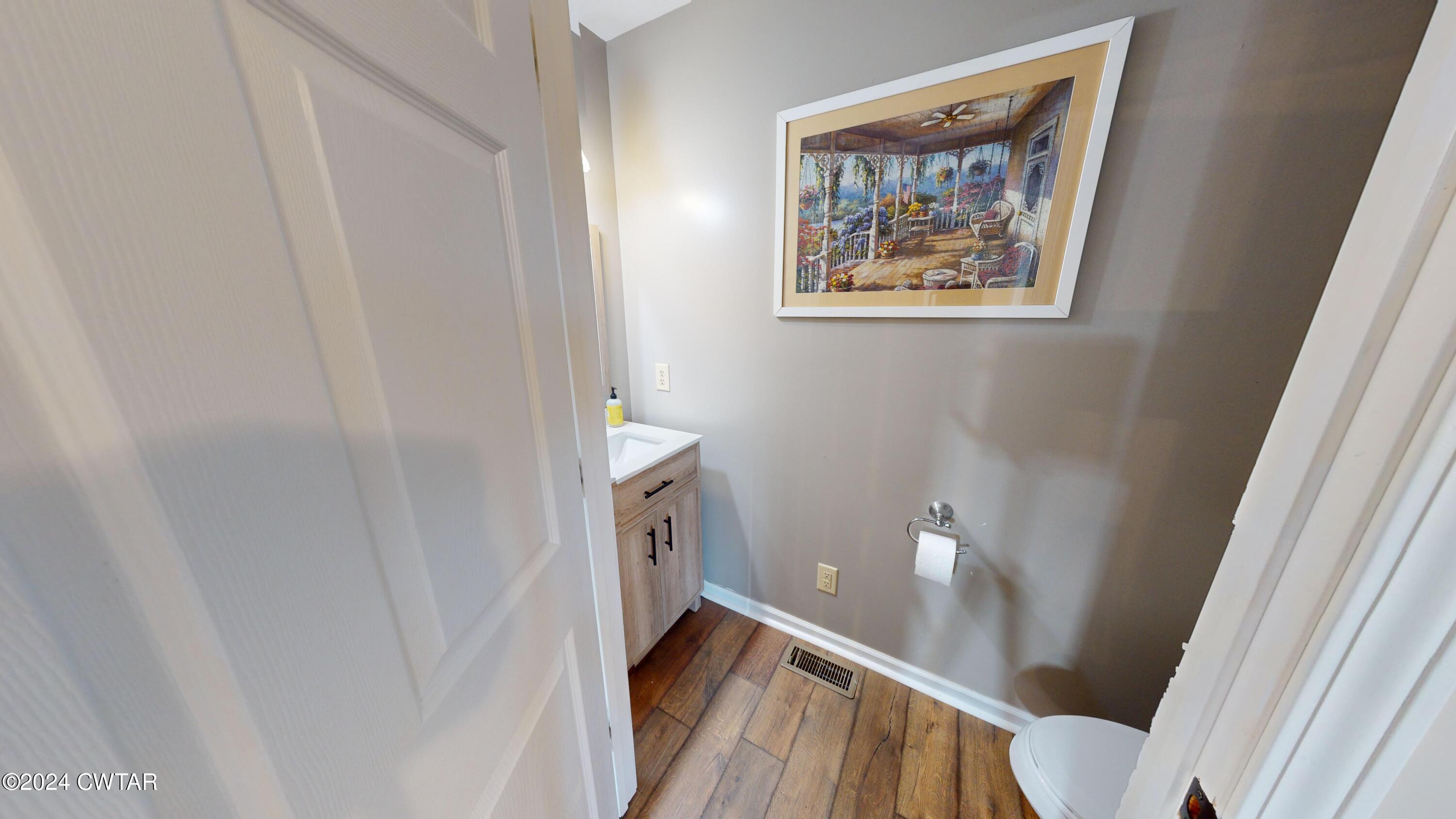 3999 Cloverdale Road Obion, TN 38240 - Photo 18 of 42 a bathroom with a sink and a toilet