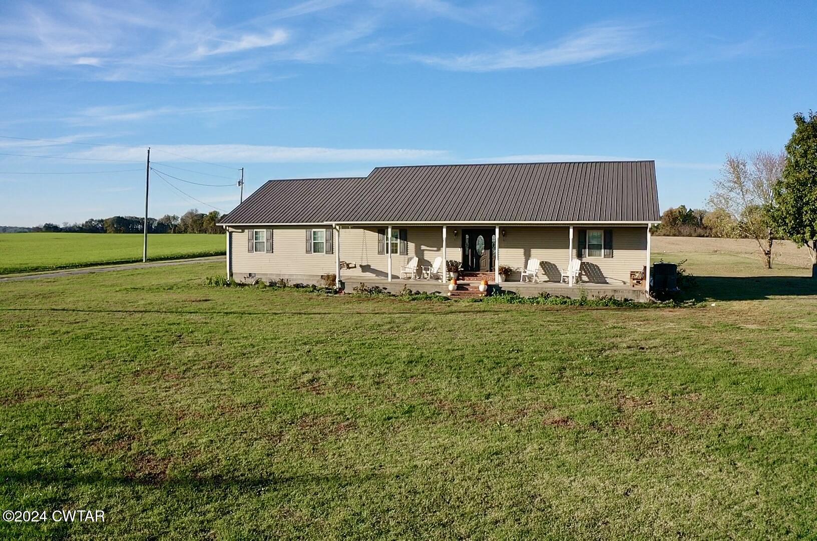 3999 Cloverdale Road Obion, TN 38240 - Photo 37 of 42 a front view of a house with garden