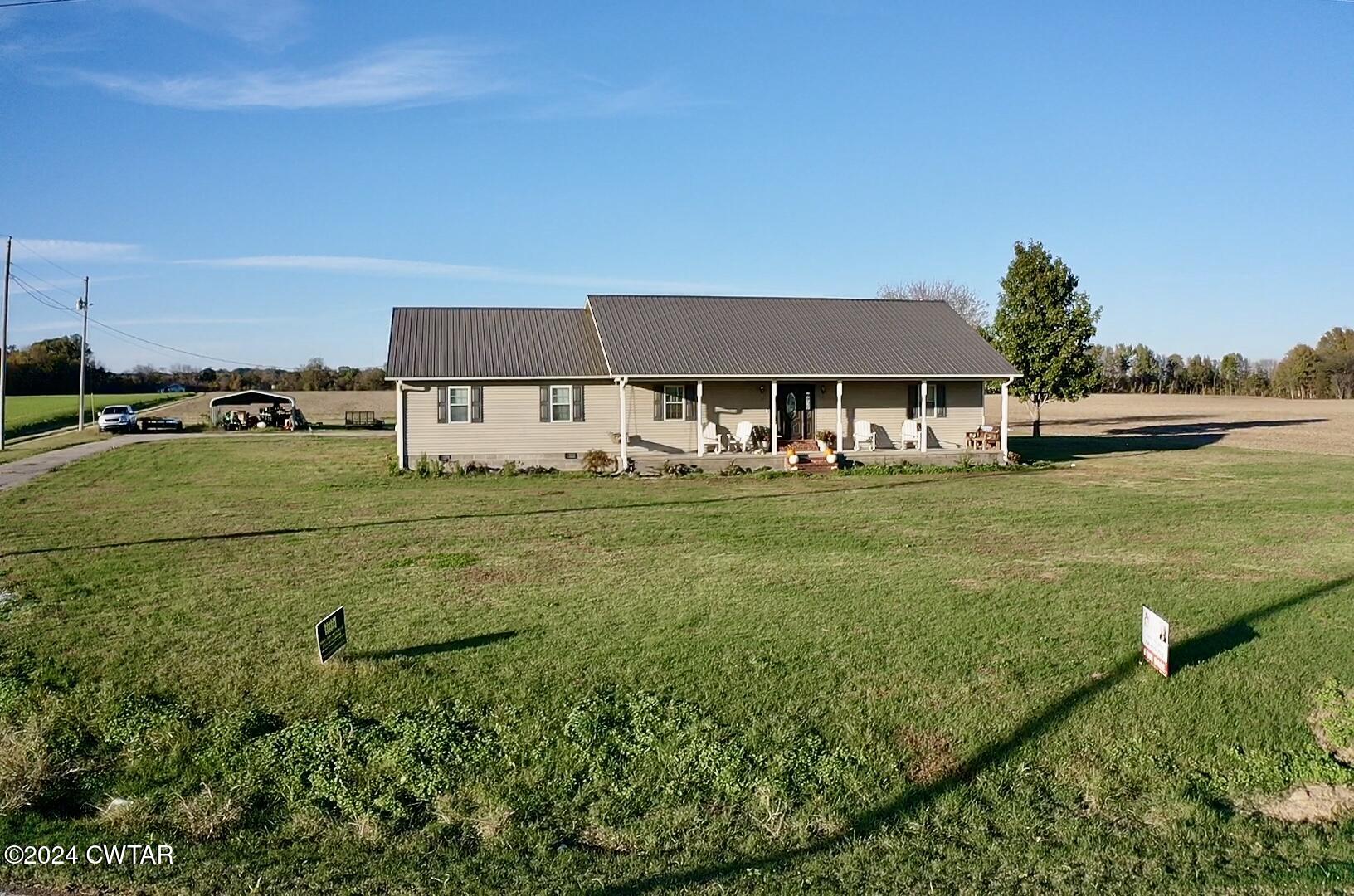 3999 Cloverdale Road Obion, TN 38240 - Photo 38 of 42 a front view of a house with garden