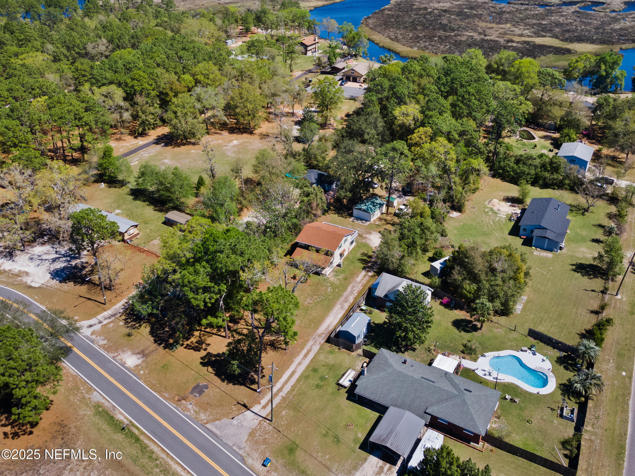 2357 Davis Road Jacksonville, FL 32218 - Photo 28 of 28 an aerial view of residential houses with outdoor space