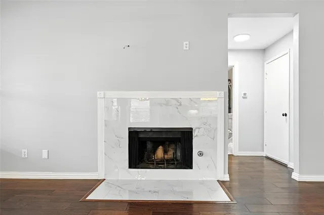 a kitchen with stainless steel appliances kitchen island granite countertop a sink cabinets and window