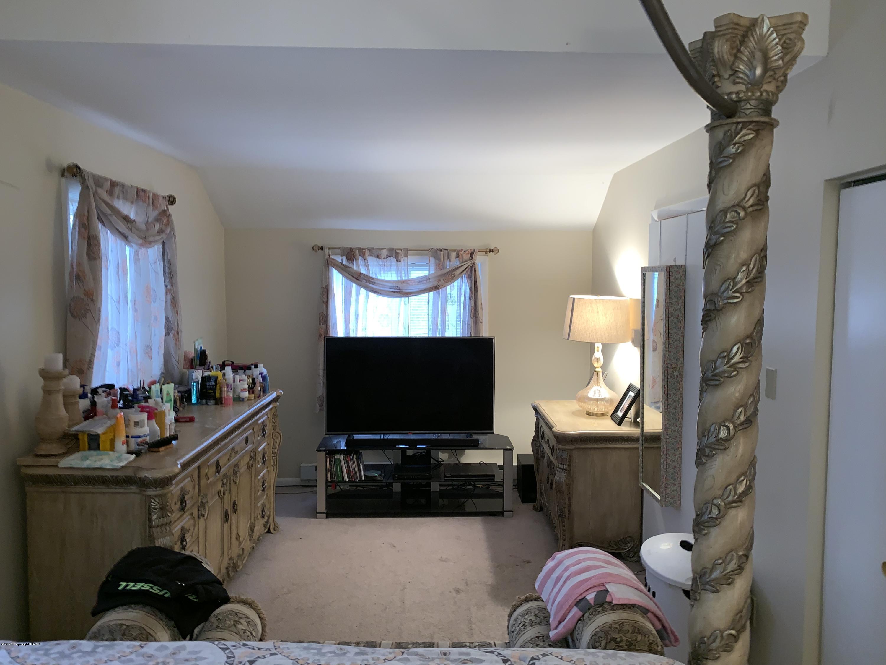 6441 Decker Road Bushkill, PA 18324 - Photo 11 of 19 a living room with furniture and a flat screen tv