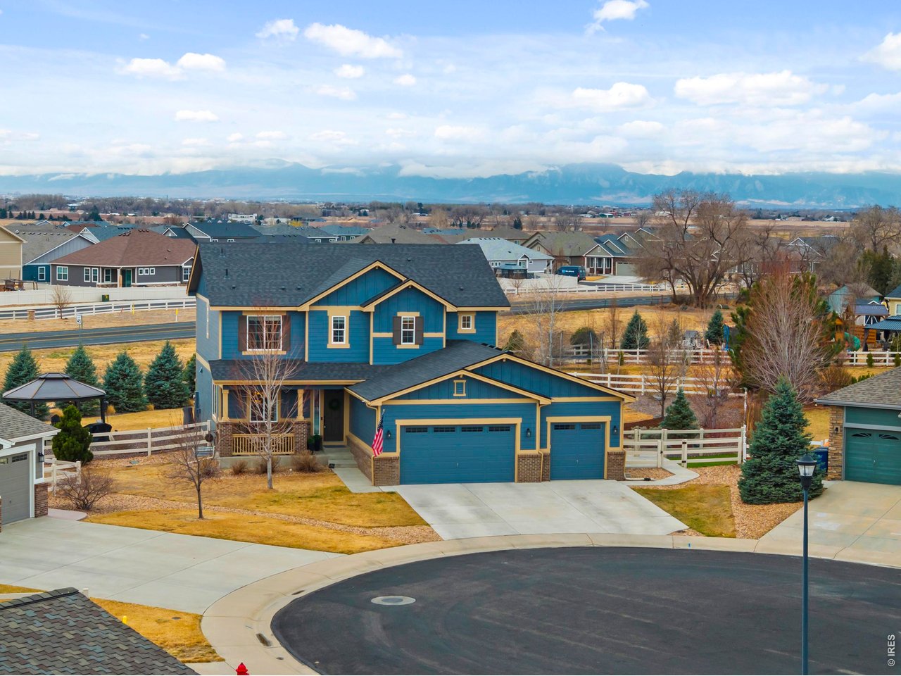 9033 Foxfire Street Firestone, CO 80504 - Photo 3 of 44 a view of a city with tall buildings