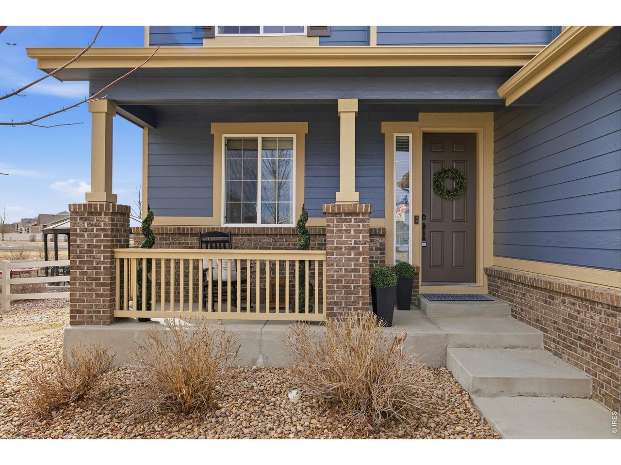 9033 Foxfire Street Firestone, CO 80504 - Photo 5 of 44 a view of a house with a bench