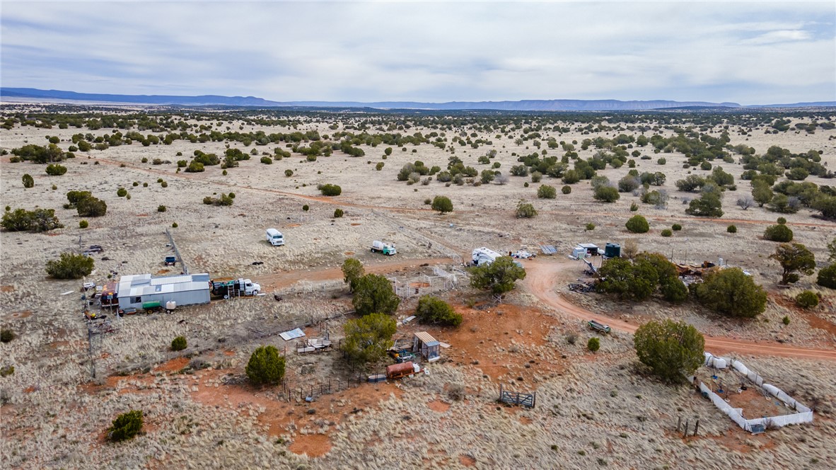 0 Rocky Top Road Seligman, AZ 86337 - Photo 18 of 29 a view of a dry yard with wooden fence