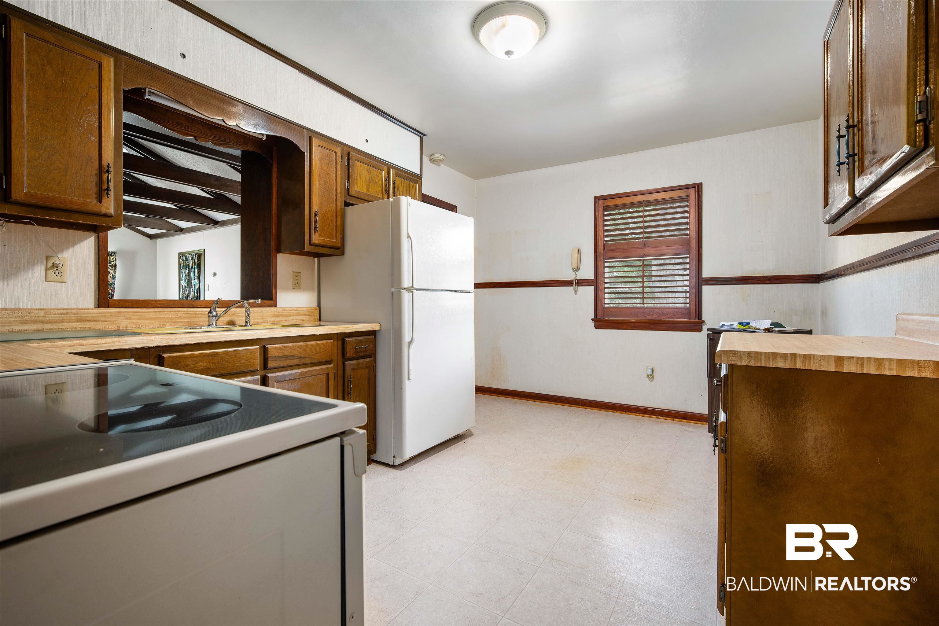 2300 Ellen Drive Mobile, AL 36605 - Photo 10 of 25 Kitchen with white appliances and sink