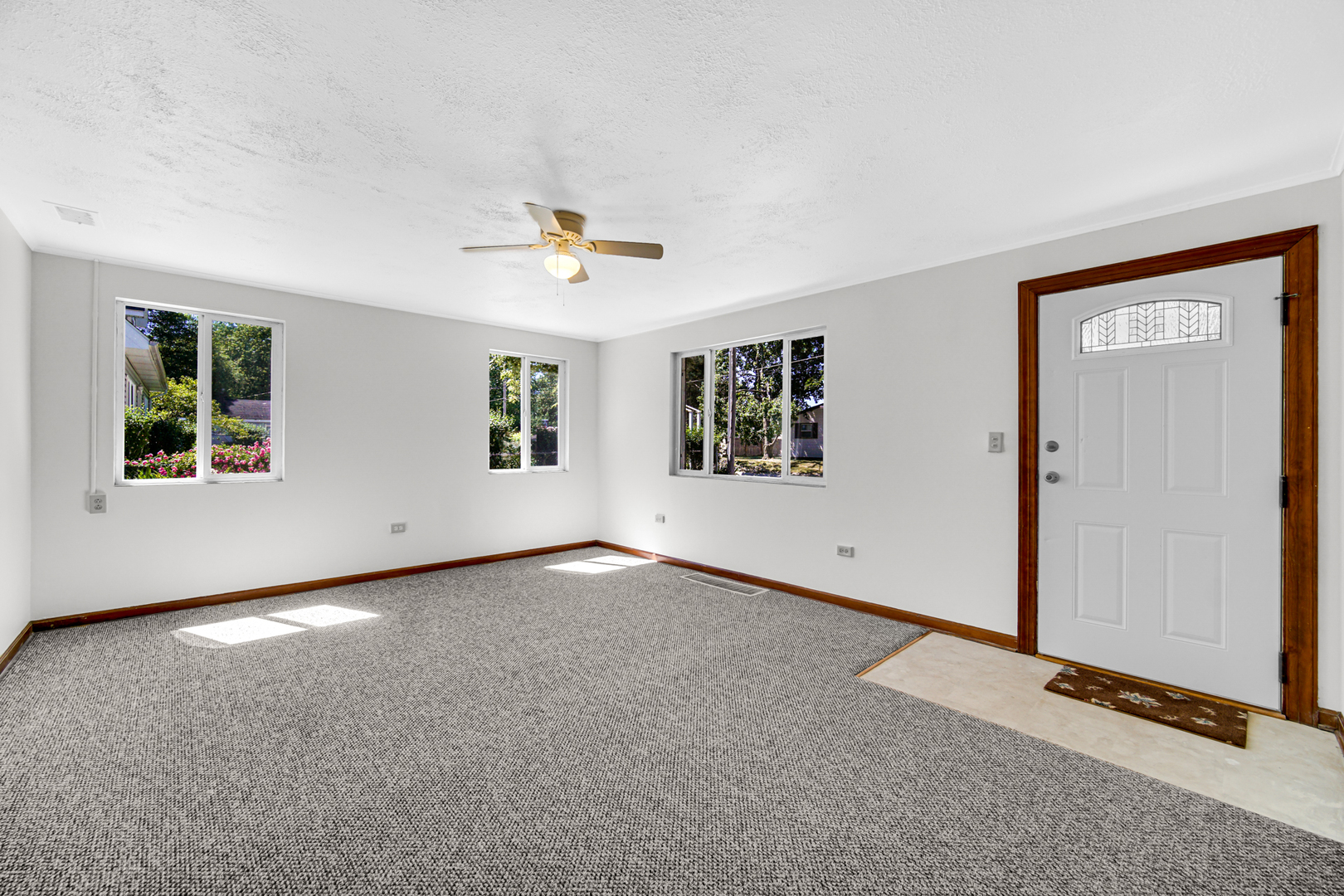 5201 Bell Avenue Portage, IN 46368 - Photo 6 of 16 a view of an empty room with a window