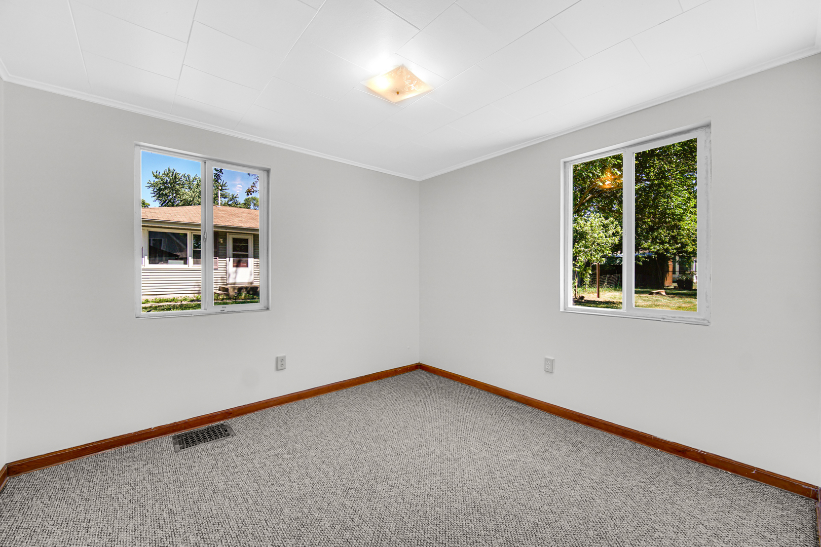 5201 Bell Avenue Portage, IN 46368 - Photo 7 of 16 a view of an empty room with a window