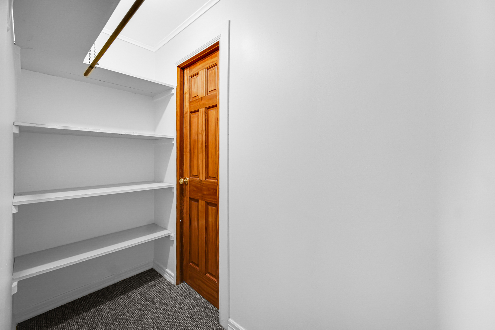 5201 Bell Avenue Portage, IN 46368 - Photo 8 of 16 a view of walk in closet with empty racks
