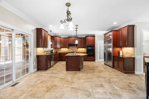 $750,000 | 301 Covenant Rock Lane, Holly Springs, NC 27540