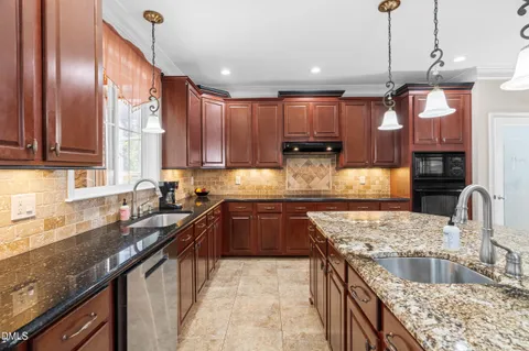 $750,000 | 301 Covenant Rock Lane, Holly Springs, NC 27540