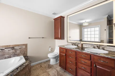 $750,000 | 301 Covenant Rock Lane, Holly Springs, NC 27540