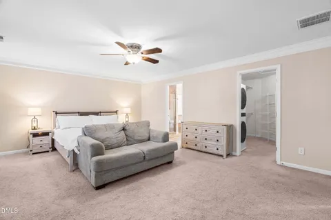 a bath tub sitting next to a shower