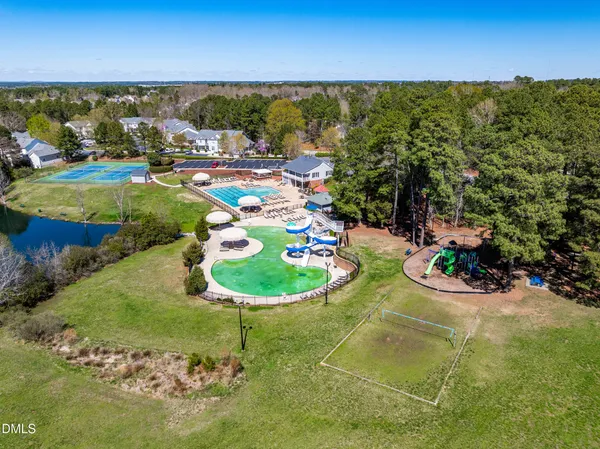 a view of a pool with a lake view
