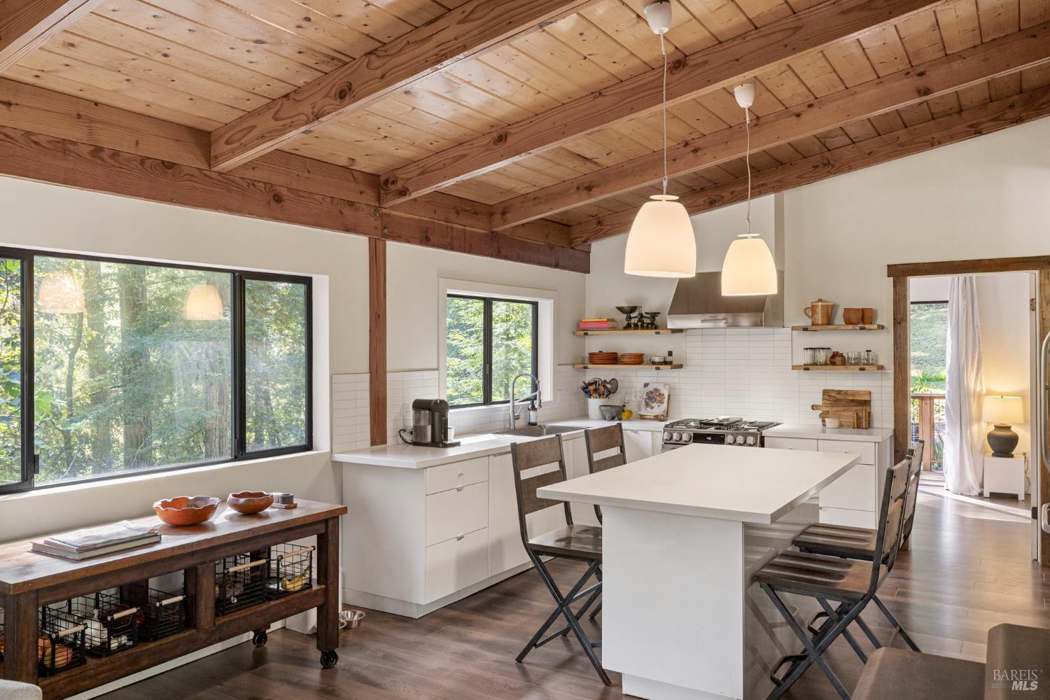 16798 Armstrong Woods Road Guerneville, CA 95446 - Photo 18 of 71 a view of a dining room with furniture window and outside view