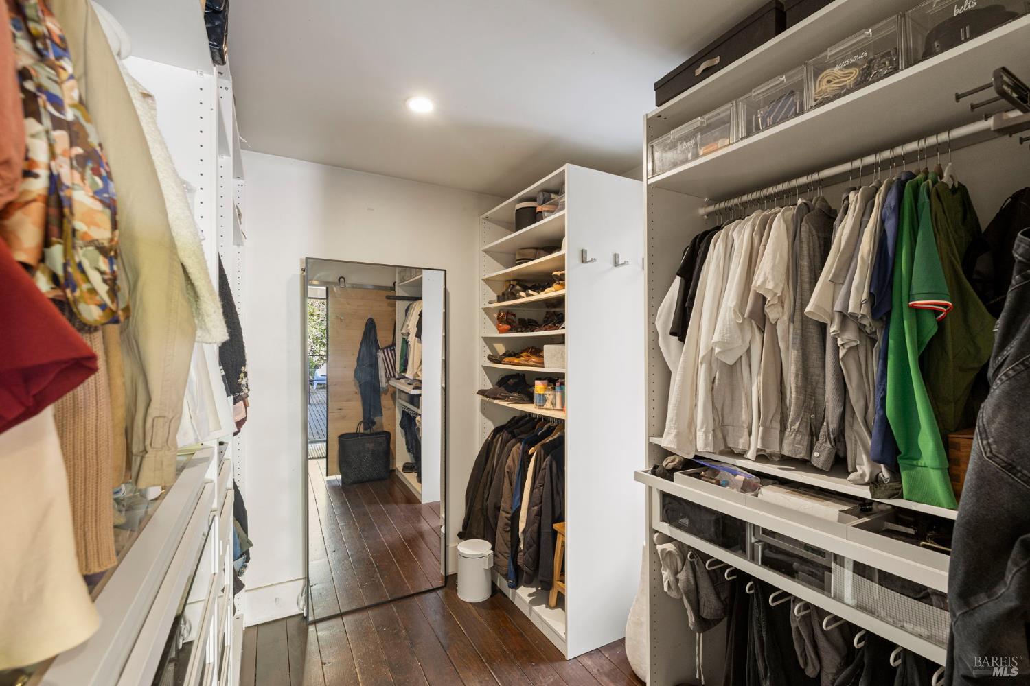 16798 Armstrong Woods Road Guerneville, CA 95446 - Photo 34 of 71 a view of walk in closet with clothes and shoes