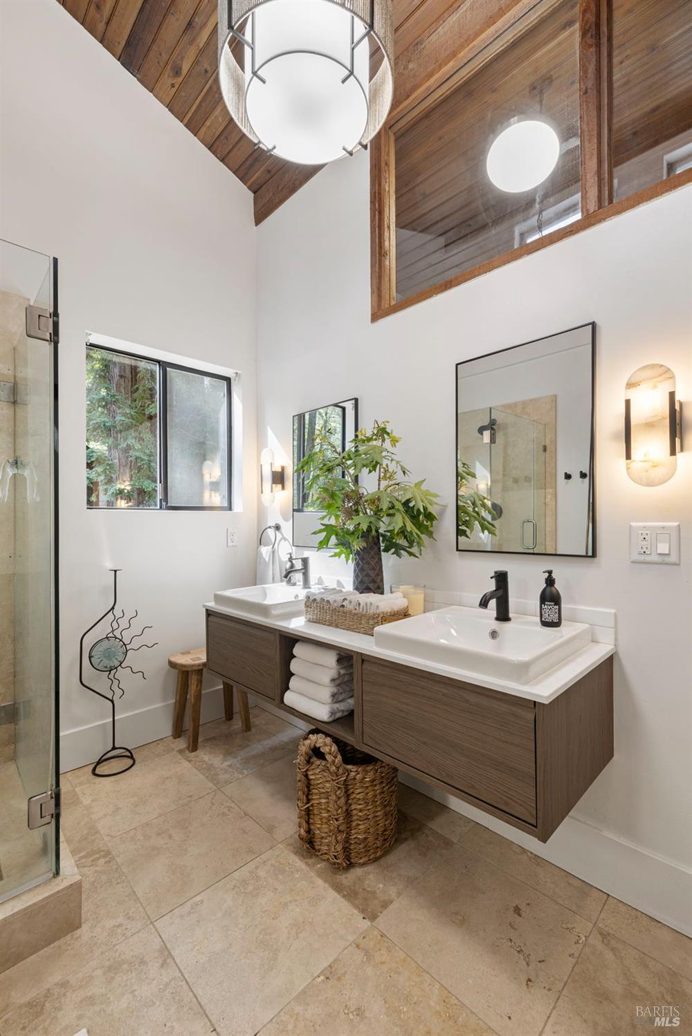 16798 Armstrong Woods Road Guerneville, CA 95446 - Photo 40 of 71 a bathroom with a sink and a mirror