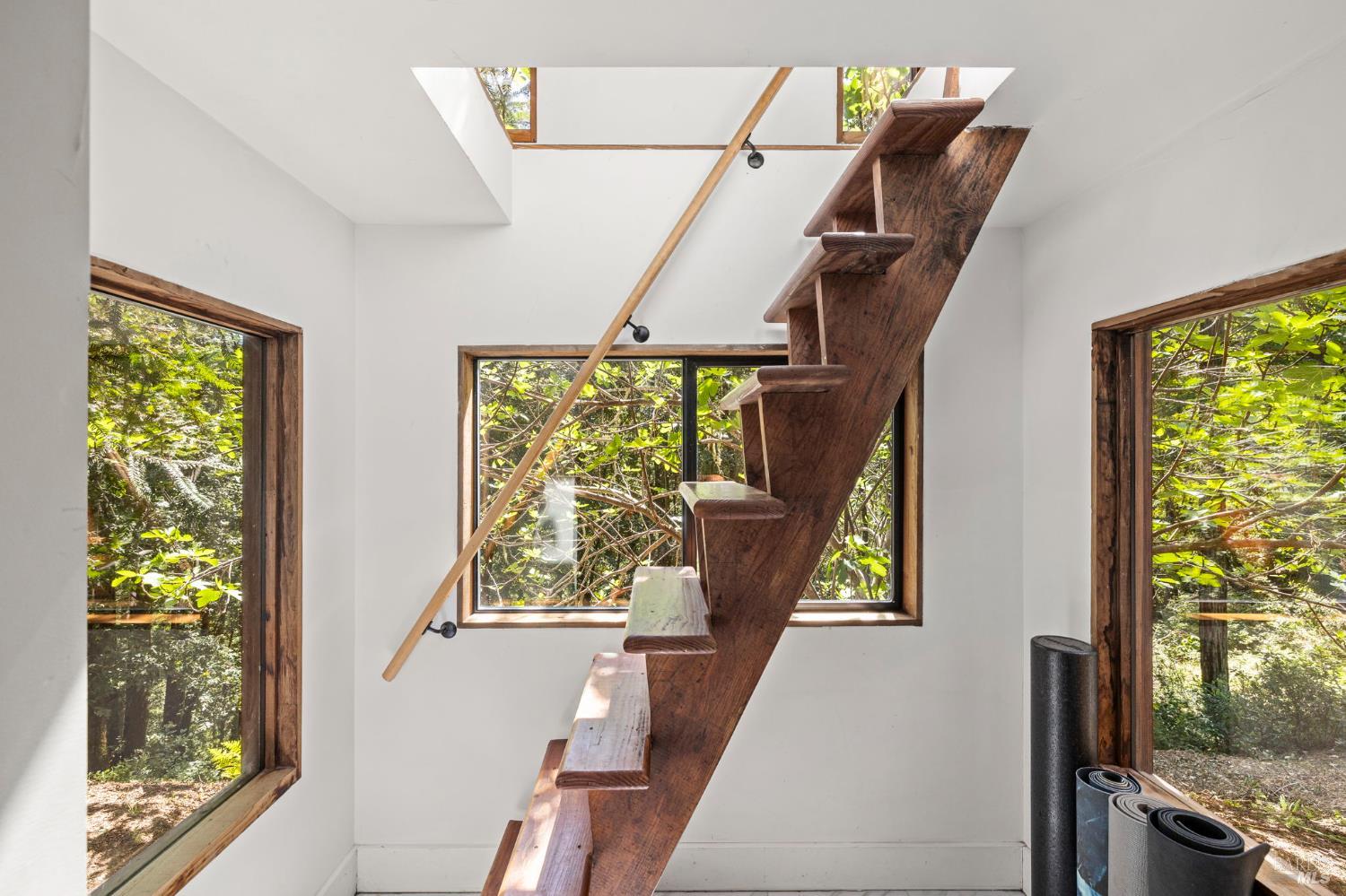 16798 Armstrong Woods Road Guerneville, CA 95446 - Photo 46 of 71 a view of an entryway with a floor to ceiling window